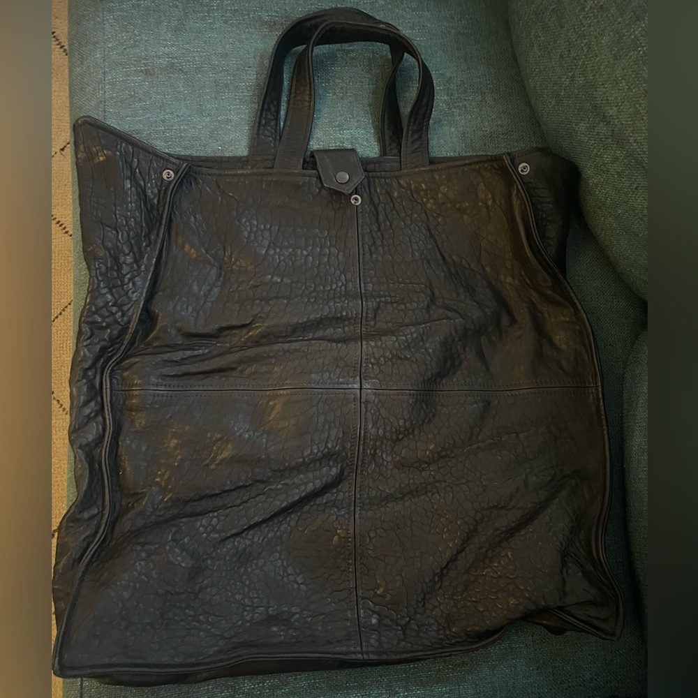 Camilla Staerk Leather Portfolio
Travel Bag